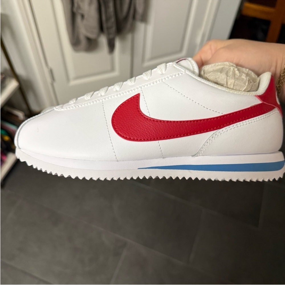 Nike White Leather Sneaker with Red Swoosh and Blue Midsole Stripe